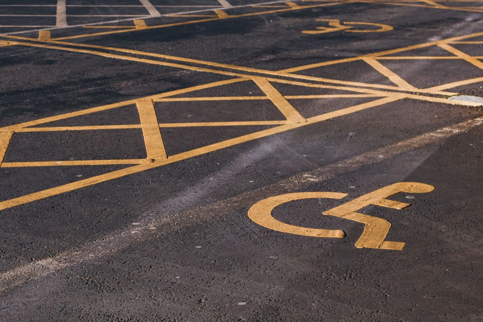 Accessible parking markings on an asphalt parking lot